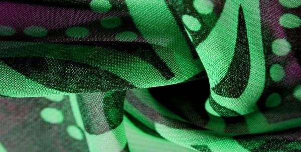Текстура фона обои шаблон. Зеленый розовый черный шелк — стоковое фото