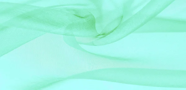 Texture of green silk fabric. It is also perfect for your design