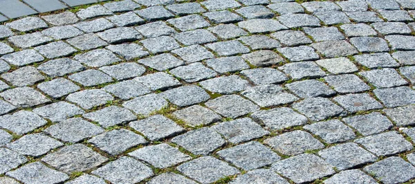 Granite pavement, roadway, road, paving, causeway, pave. a very — Stock Photo, Image