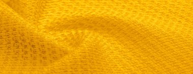Arka plan dokusu, desen. Metalik payetler ile sarı kumaş
