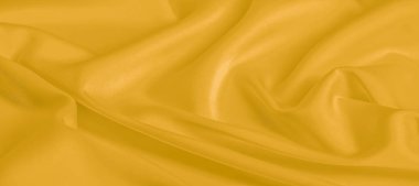 arka plan dokusu, desen. Sarı ipek kumaş. Çok hafif bir fa