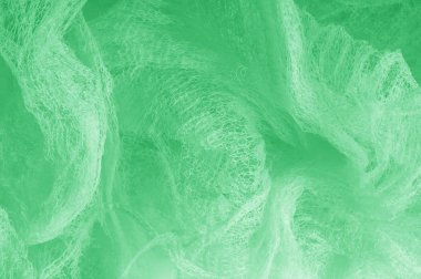 Örgü yeşilli kumaş. Sizin için ruhani parlaklık bir çizgi ekleyin