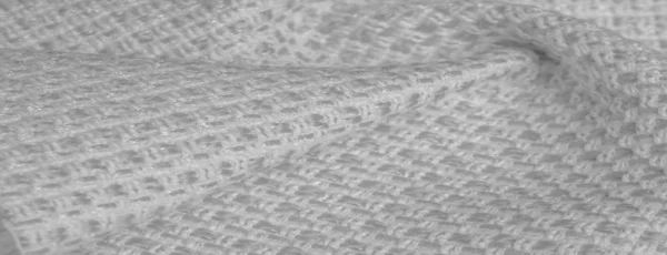 Tekstura tła, wzór. Biała tkanina z metalowymi cekinami, — Zdjęcie stockowe