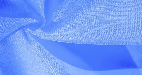 Texture, background, pattern, silk blue fabric. Crepe satin on t — Stock Photo, Image