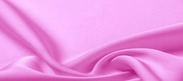Texture. Pink silk fabric. brilliant luster and characteristic — Stock Photo, Image