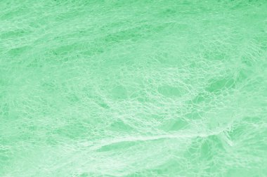 Örgü yeşilli kumaş. Sizin için ruhani parlaklık bir çizgi ekleyin