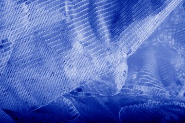 Doku, arka plan mavi tül. Hacim, yetenek veya ayrıntılı d ekleme