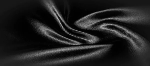 Текстура, фон, візерунок. Чорна шовкова тканина. Він чорний і — стокове фото
