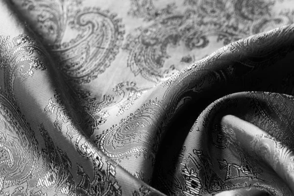 Texture, fond, tissu gris acier noir avec une patte paisley — Photo