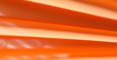 Resim Doku, arka plan Turuncu ipek kumaş. Bir mucizesi var.