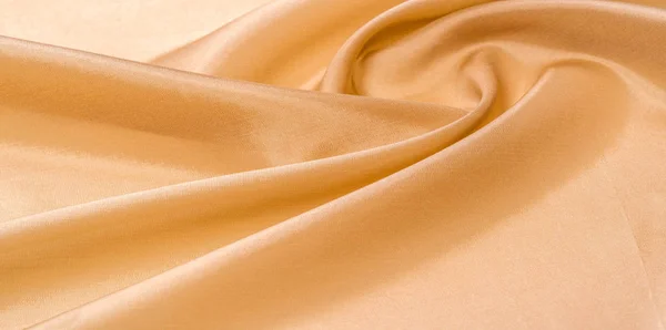 Figure, background, pattern. Light brown silk fabric. This is th — Stock Photo, Image