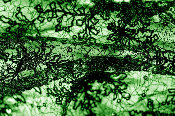 Textura, patrón, tela de encaje en verde sobre un fondo blanco. Th — Foto de Stock