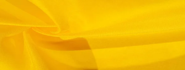 Pola latar belakang tekstur, sutra dari kain kuning. Crepe satin o — Stok Foto