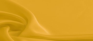 arka plan dokusu, desen. Sarı ipek kumaş. Çok hafif bir fa