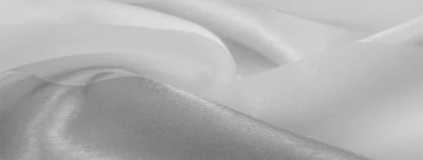 Textur, bakgrund, vitt sidenrandigt tyg med metalliskt s — Stockfoto