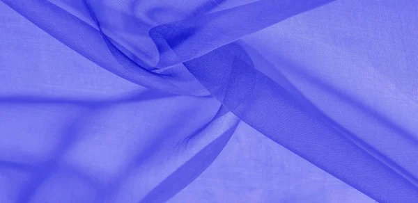 Texture of blue silk fabric. It is also perfect for your design,