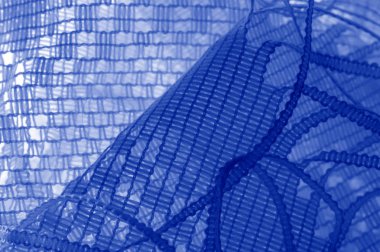 Doku, arka plan mavi tül. Hacim, yetenek veya ayrıntılı d ekleme