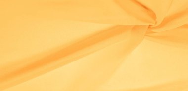 doku arka plan deseni. Ince bir paspas ile sarı ipek kumaş