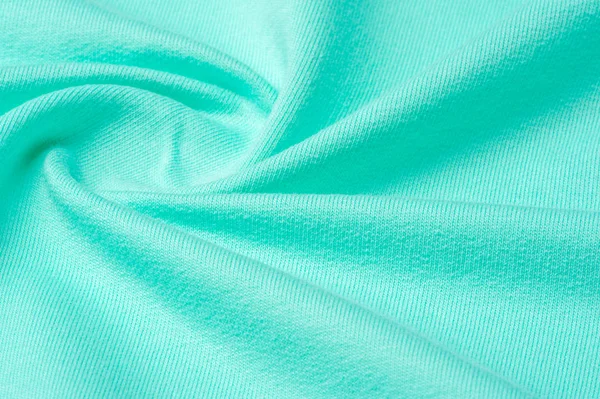 Textuur, achtergrond, patroon. De stof is gebreid blauw, Turqu — Stockfoto