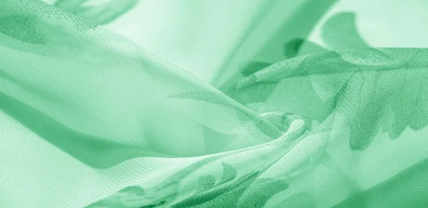 Texture background, pattern, wallpaper. white silk fabric, green