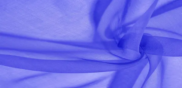 Texture of blue silk fabric. It is also perfect for your design,