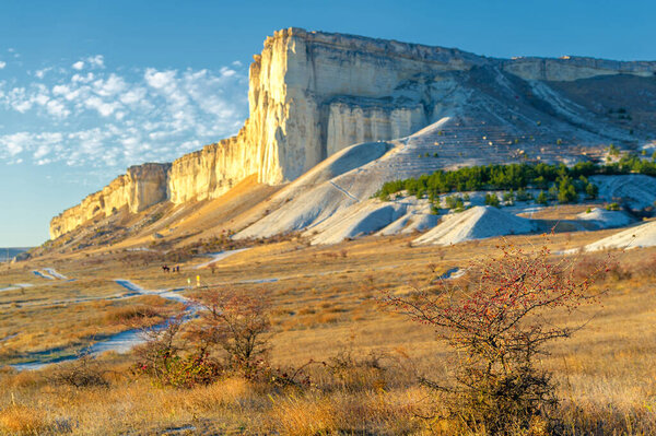 Foreground focus Photos of the Crimean autumn peninsula, Ak-Kaya White rock, Belogorsky district, the Biyuk-Karasu river, the Mousterian era, the settlements of the Sarmatians and Scythians, Altyn Teshik cave