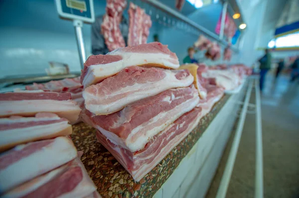photo of the market, pork, fat with layers of meat, red appetizing pieces of meat