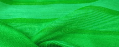 Doku, arkaplan, desen, tasarım, beyaz çizgili kumaş yeşil, projeleriniz için kalın ve parlak bir kumaş. Çok çeşitli renklerde pek çok yumuşak ovayla