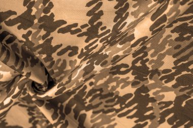 Arkaplan tasarımı dokusu, kumlu sepia sarı ipek kumaş, soyutlama, telif izi, askeri kamuflaj kumaşı, tasarımlarınız askeri bir kumaş olmanızı sağlayacak.,