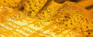 Arkaplan, doku, desen, sarı dantel kumaş, ince açık kumaş, genellikle pamuktan ya da ipekten yapılmış, halkalar, kıvrımlar ya da örgü iplikleriyle örülmüş.