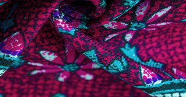 Arka plan tasarım dokusu, kırmızı ipek kumaş ve mavi çiçek desenli daireler. Charmeus 'un çok güzel bir kumaşı var. Yumuşak bir doluluk içinde birleştirilebilir..