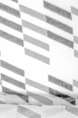 Doku. Geçmişi. Şablon. Siyah geometrik eşkenar dörtgen şekilli beyaz ipek kumaş. karanlık, samur, ebon, müstehcen