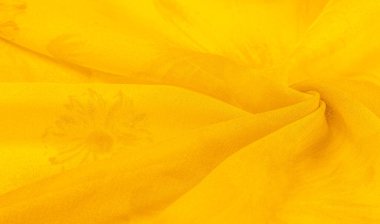 Arkaplan dokusu, sarı ipek kumaş boyalı çayır çiçekleri, spektrumda yeşil ve turuncu arasında renkler, ana çıkarıcı renk, olgun limon ya da yumurta sarısı gibi boyanmış..
