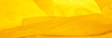 Arkaplan dokusu, sarı ipek kumaş boyalı çayır çiçekleri, spektrumda yeşil ve turuncu arasında renkler, ana çıkarıcı renk, olgun limon ya da yumurta sarısı gibi boyanmış..