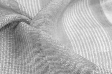 Doku, arkaplan, desen, tasarım, beyaz çizgili gri-beyaz kumaş, projeleriniz için cesur ve parlak bir kumaş. Çok çeşitli renklerde pek çok yumuşak ovayla