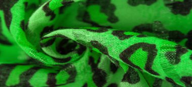 Doku, arkaplan, desen, ipek kumaş yeşil, leopar desenli. Hafif leopar desenli ipek tasarımınız için mükemmel, şık görünüyor ve kaba değil.!