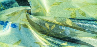 desen, şekil, arka plan. Bu güzel kumaş metalik gümüş kayganlaştırıcı ile süslenmiş soyut bir deseni var, bu da büyük bir görsel ilgi uyandırıyor. Tasarımlarınıza zarafet eklemek için ideal