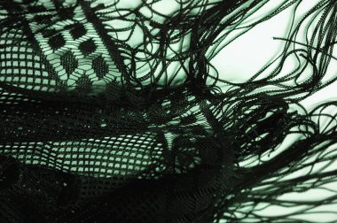 Doku, arkaplan, tasarım, yeşil kadın dantelinden şal, yeşil dantelden örgü, püskül, el örgüsü. Çiçek festivali. Tasarımınız, düğün üçgeniniz, gelinin tebrik kartı..