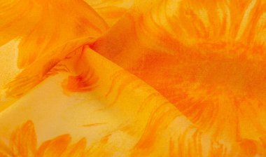 Arkaplan dokusu, boyalı çayır çiçekleri olan turuncu ipek kumaş.