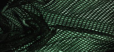 Doku, arkaplan, tasarım, yeşil kadın dantelinden şal, yeşil dantelden örgü, püskül, el örgüsü. Çiçek festivali. Tasarımınız, düğün üçgeniniz, gelinin tebrik kartı..