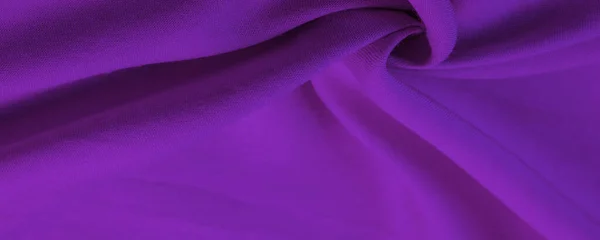 Texture, background, design, lilac fabric, twill. Thin fabric with diagonal weaving of threads. From Latin and French, the name of the material is translated as silk