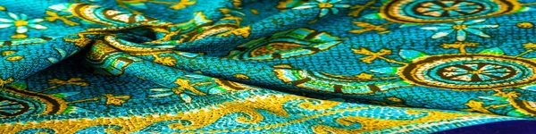 Texture Background Design Turquoise Silk Fabric Yellow Drawings Flowers Circles — Stock Photo, Image