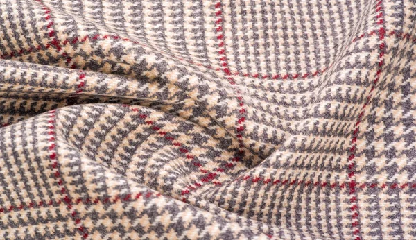 Background texture, pattern. The fabric is thick, warm in a cage, beige. This is 100% wool terry dressing. Sinil has a soft pile and is very versatile. It fits your design. — Stock Image Background Texture Pattern Fabric Thick Warm Cage Beige 100 Wool Stock Image