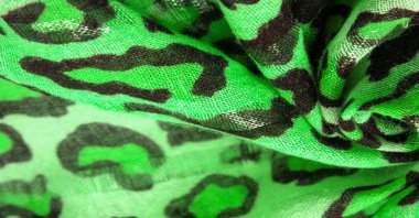Doku, arkaplan, desen, ipek kumaş yeşil, leopar desenli. Hafif leopar desenli ipek tasarımınız için mükemmel, şık görünüyor ve kaba değil.!