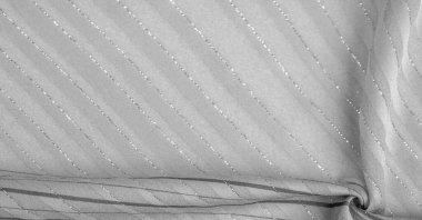 Tasarım arka plan dokusu, Lurex çizgili siyah beyaz kumaş, taze ve rahat bir stil için mükemmel..