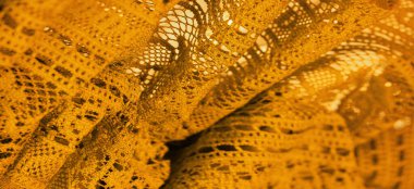 Arkaplan, doku, desen, sarı dantel kumaş, ince açık kumaş, genellikle pamuktan ya da ipekten yapılmış, halkalar, kıvrımlar ya da örgü iplikleriyle örülmüş.