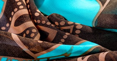 doku, arka plan, desen, duvar kağıdı. kahverengi ipek kumaş deseni. Bu orta ağırlık rayon kumaş hafif renk varyasyonları ile güzel bir parlaklık vardır. Tasarımlarınıza şıklık katıyor.