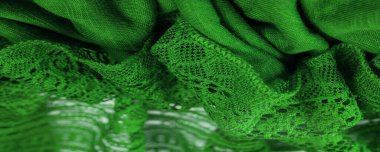 Arkaplan, doku, desen, yeşil dantel kumaş, ince açık kumaş, genellikle pamuktan ya da ipekten yapılmış, halkalar, bükme ya da örgü iplikleri kullanarak desenler halinde yapılmış.