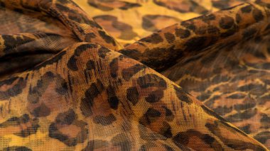 doku, ipek kumaş, leopar derisi, kahverengi-sarı siyah tonlar, sıcak Afrika safarisi,