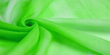 Kalıplı desenler koleksiyonu, ipek kumaş, yeşil-mavi-sarı ve beyaz çiçekler, tozlu yeşil tül